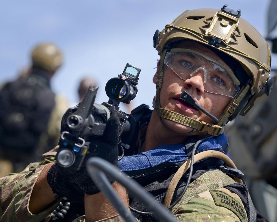  In another photo taken by Will Haigh, who won Royal Navy Photographer of the Year, we see Marine Chase taking part in a boarding exercise