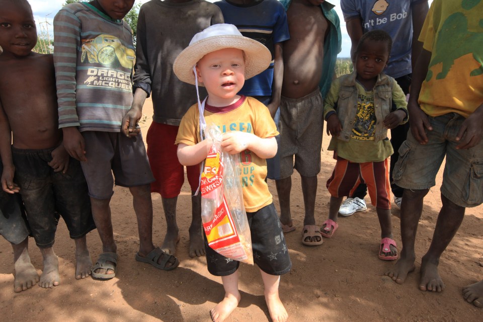  Cassim Jaffalie, 3, is seen with his friends at his family home in Machinga