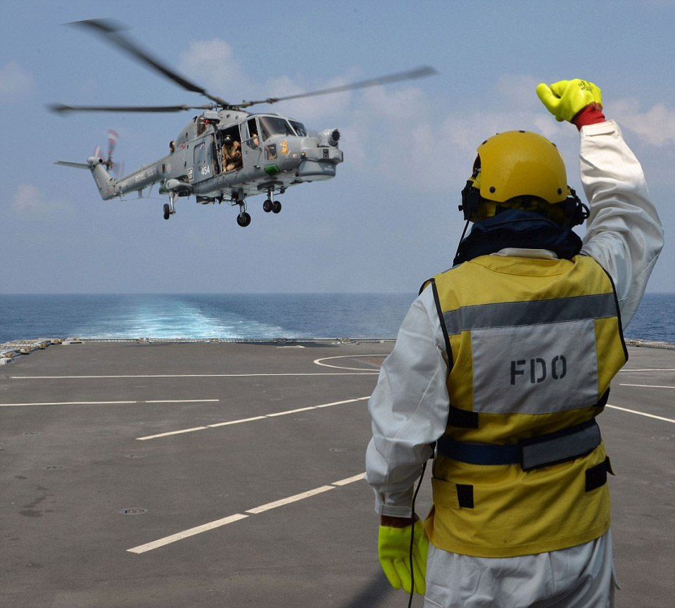  An image which was highly commended for the Peregrine Trophy, a marine signals the departure of a helicopter from the pad on HMS Defender Lynx in January this year