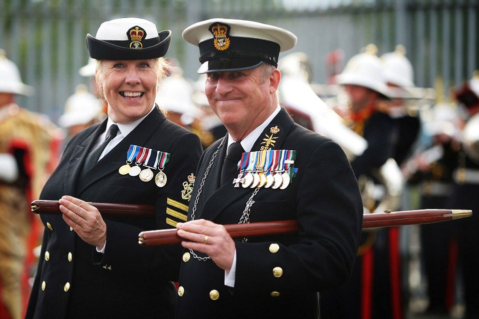  Two members of the forces share a smile as they display their commendations at the annual divisions of the Royal Naval Reserve Unit and HMS Vivid