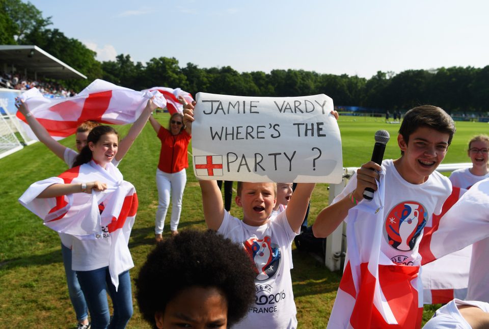  A young fan holds a banner reading 'Jamie Vardy, where's the party?'