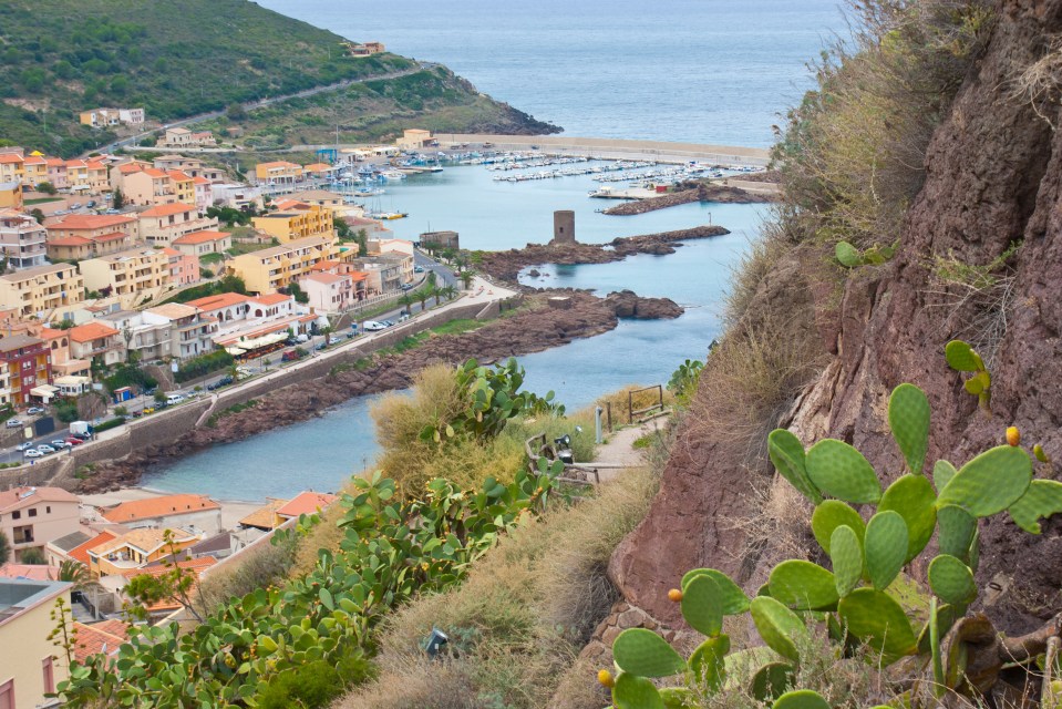  Picturesque...The harbour of Castelsardo with old tower and colourful houses makes Sardinia a beautiful holiday spot