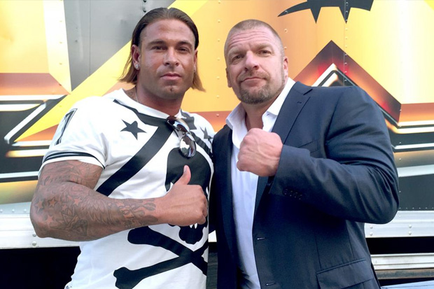  HHH (right) with former goalkeeper and potential wrestler Tim Wiese (left) at the WWE Performance Centre.