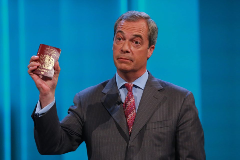  Nigel Farage brandished a British passport as he faced questions about immigration during the ITV debate