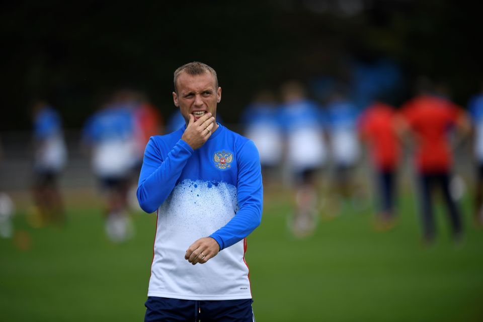  Denis Glushakov makes a gesture during training today before his physio session