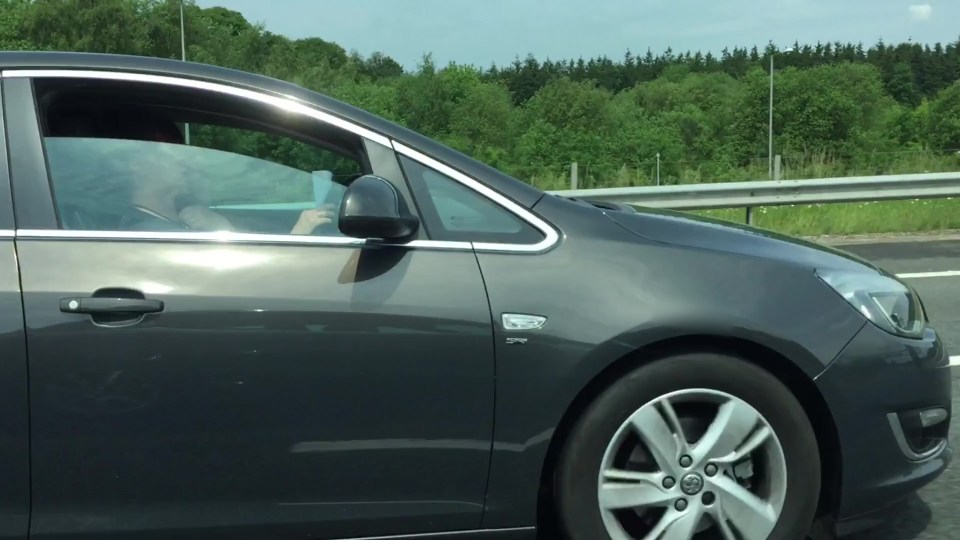  The driver and her passenger did not seem to notice they were being filmed