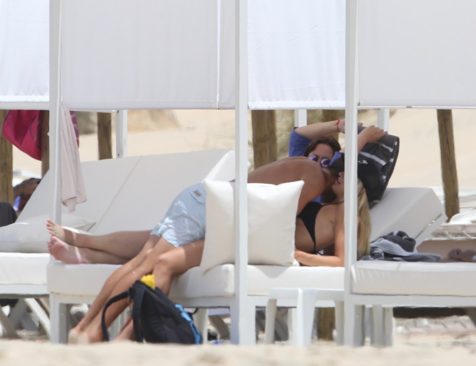  The pair can be seen getting close on a sun-lounger while enjoying their holiday