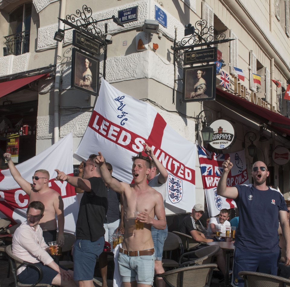  Supporters draped flags on any space available and began the ritual chanting