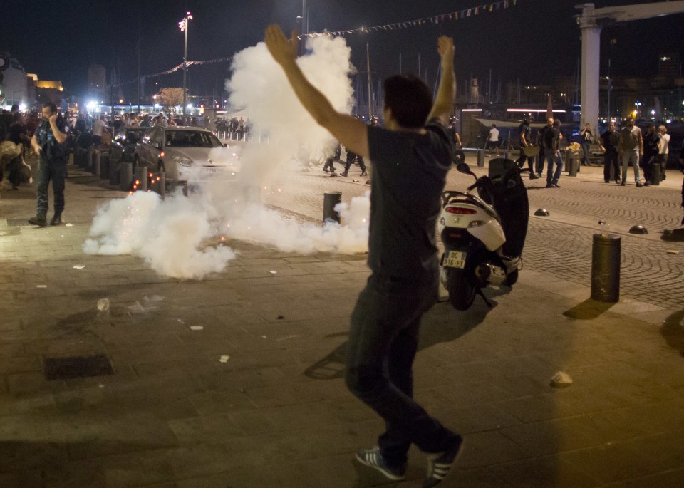  French riot police used tear gas on England fans as they clashed with French youths in the southern city of Marseilles