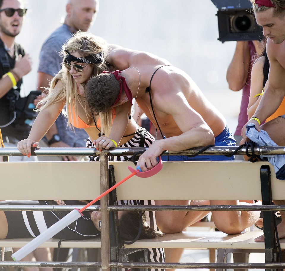  Holly Hagan also looked like the holiday had started to get the better of her, as she held onto the side of the boat for support