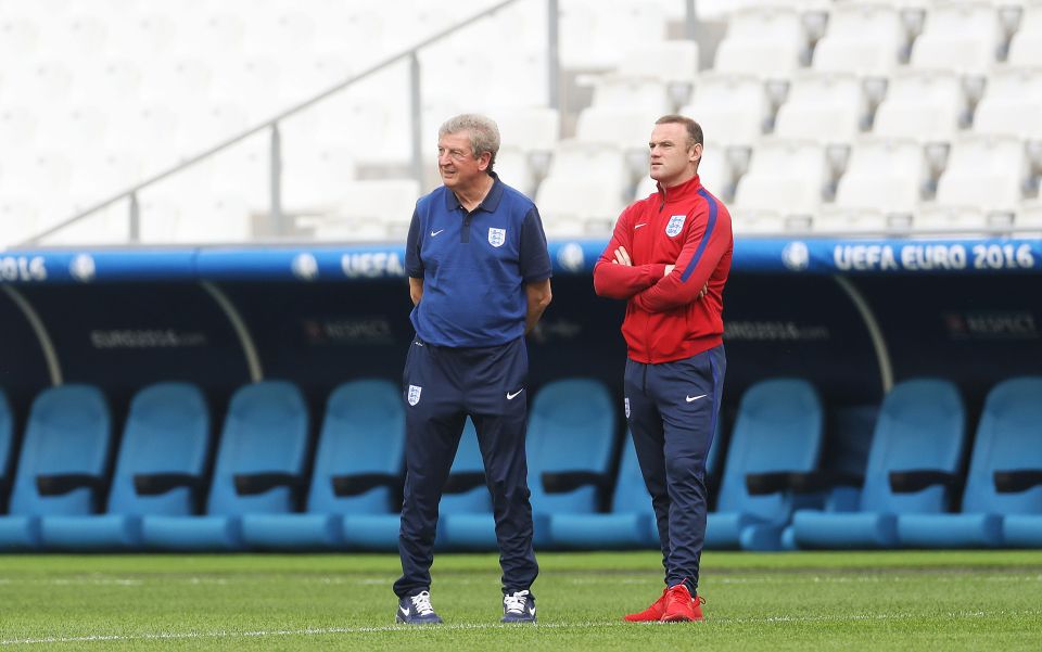  England boss Roy Hodgson and captain Wayne Rooney inspect the Marseille pitch on Friday evening - Rooney had to defend his qualities to a Russian journalist