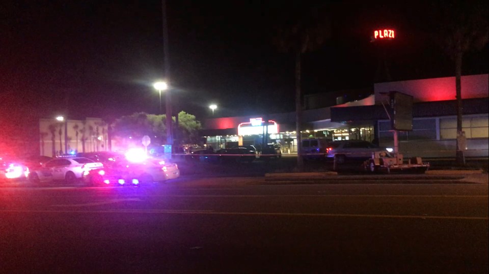  Emergency services gather outside the Plaza Live theatre venue where the killing took place