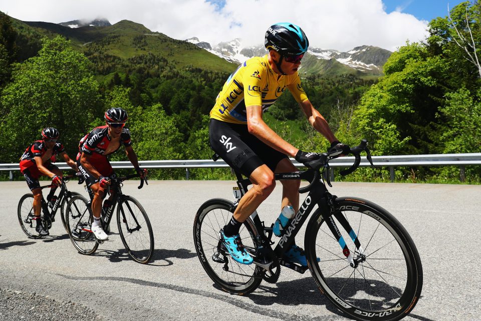  Chris Froome rides out ahead of Richie Porte at the Criterium du Dauphine race in France