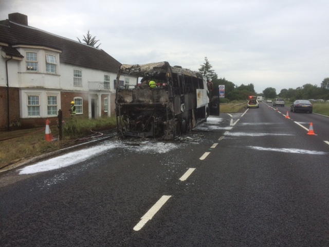  In a blaze ... Firefighters said the coach was 'well alight' by the time they arrived