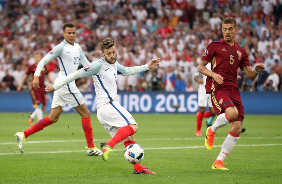 Adam Lallana strikes an early effort that tested Russia keeper Igor Akinfeev