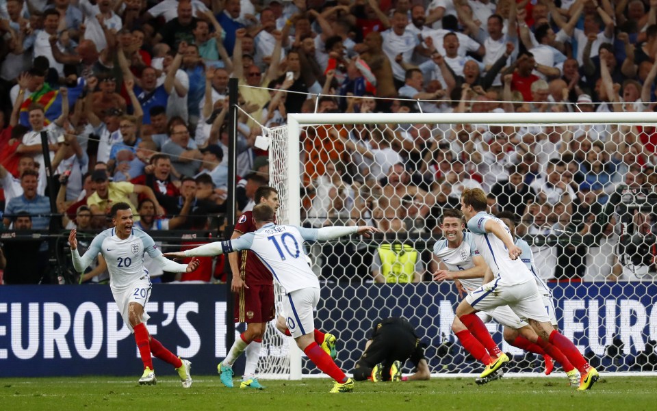 The England players wheel away in delight after Eric Dier gave them the lead