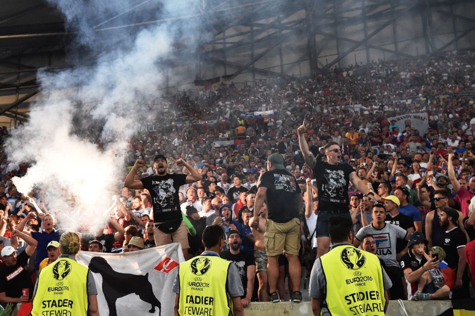 Russia supporters chant slogans during t