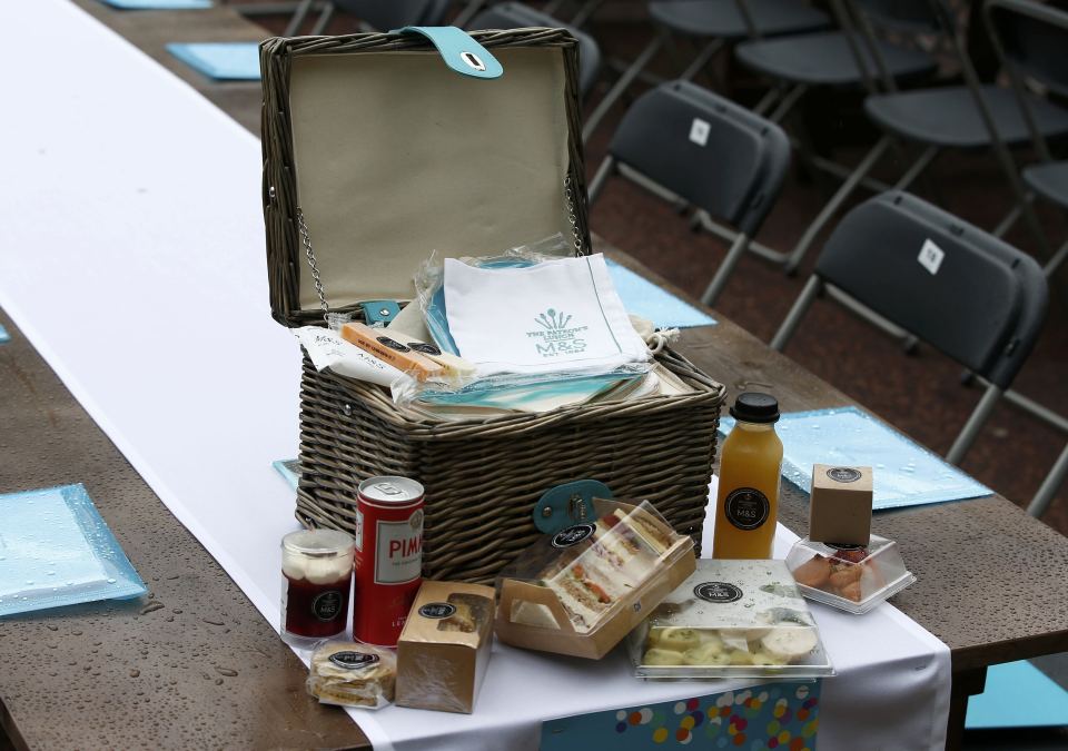 A hamper and its contents are seen on the Mall ahead of the Patron's Lunch, an event to mark Britain's Queen Elizabeth's 90th birthday, in London