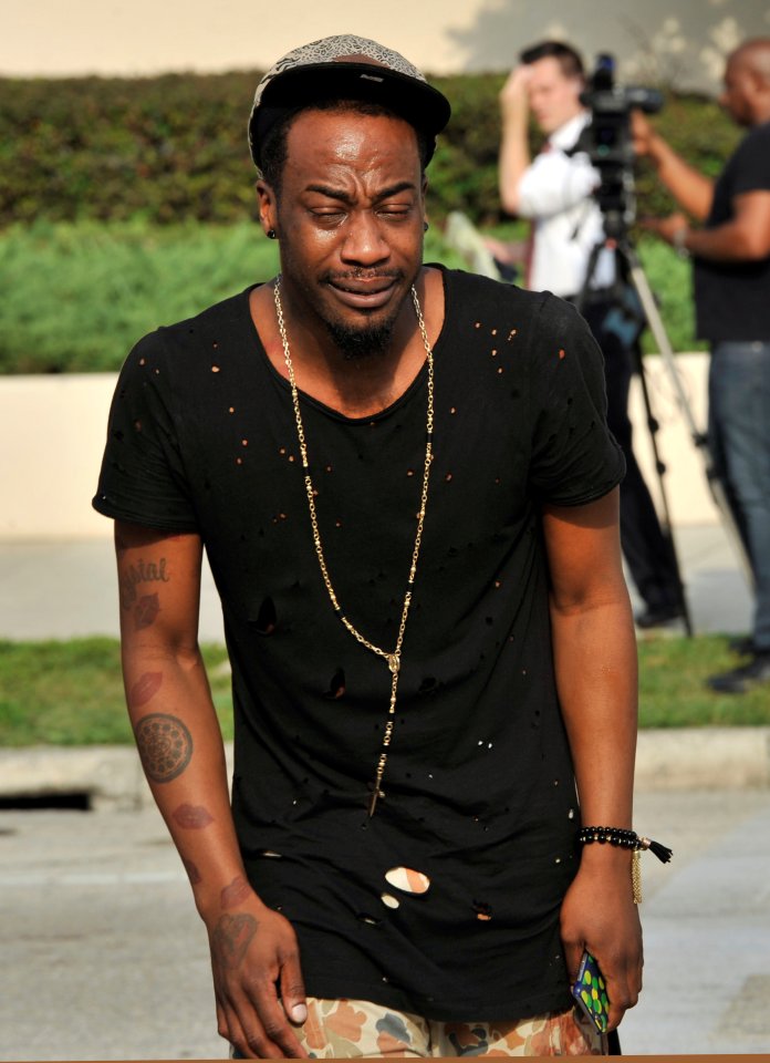 Demetrice Naulings sobs outside the Orlando Police Headquarters where police are interviewing witnesses in the investigation of a shooting at the Pulse nightclub, where people were killed by a gunman, in Orlando