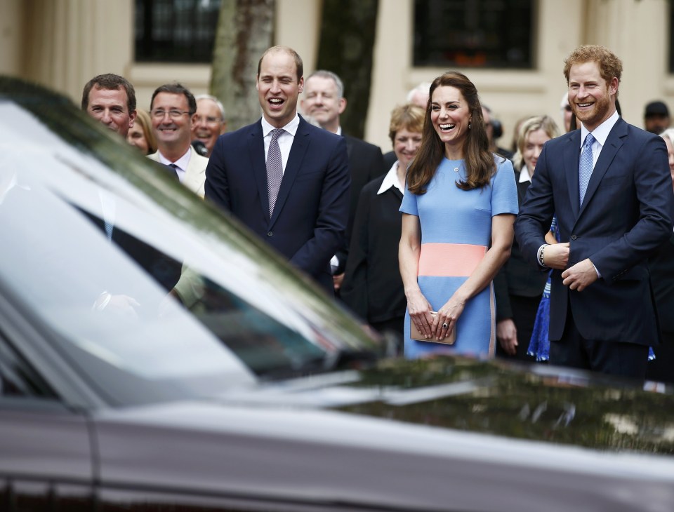 Britain's Prince William his wife Kate Duchess of Cambridge and brother Prince Harry (R) wait to greet Queen Elizabeth as she arrives at the Patron's Lunch, an event to mark her 90th birthday, in London