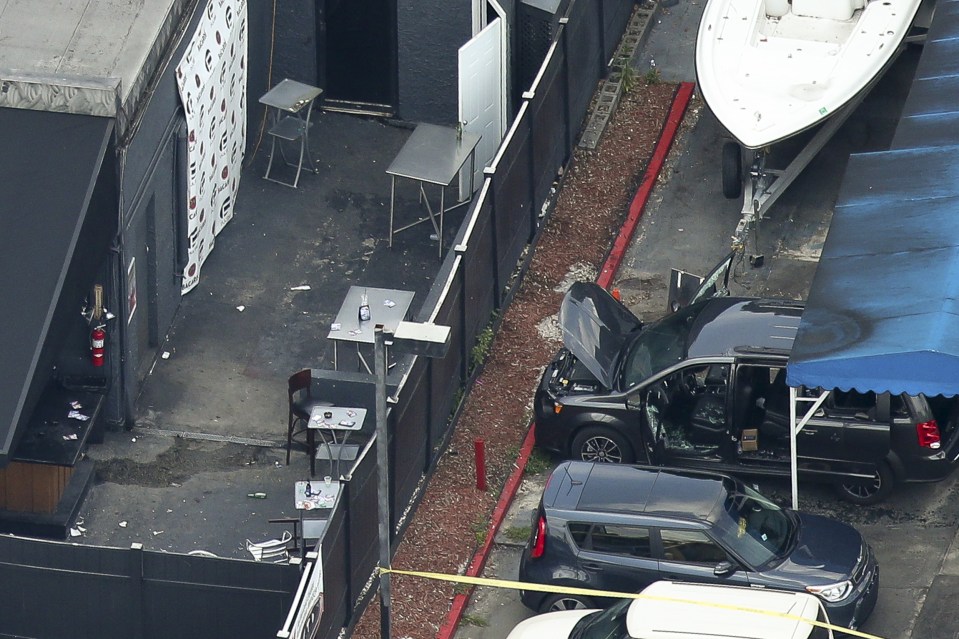 A mini van outside the Pulse nightclub in Orlando. Unconfirmed reports indicate police believe it may have been used by the shooter.