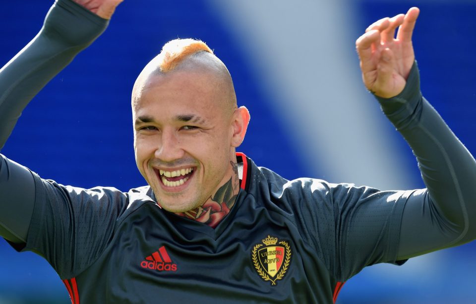 Roma midfielder Nainggoaln fools around at Belgium training 