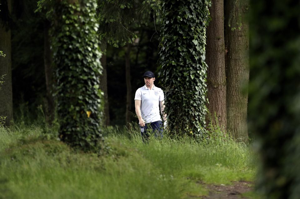  The England slipper retrieves a ball in the rough