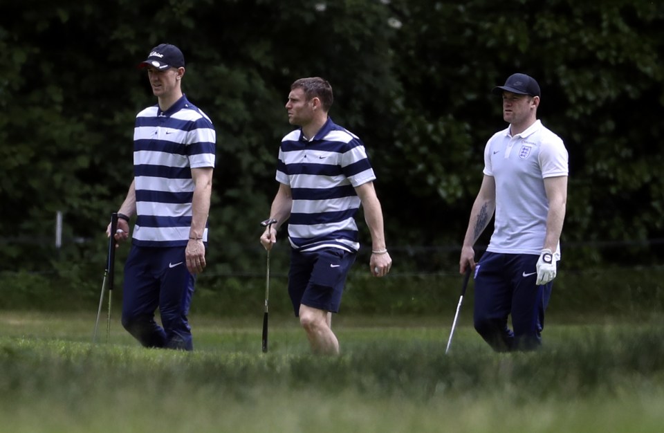  Rooney with goalkeeper Joe Hart and Liverpool midfielder  James Milner