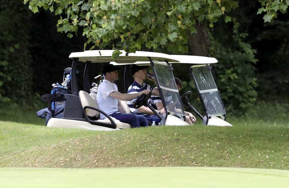  Rooney, Hart and Milner drive to their next hole