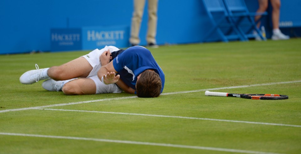  Nicolas Mahut slipped on a wet afternoon at Queen's to tweak his groin