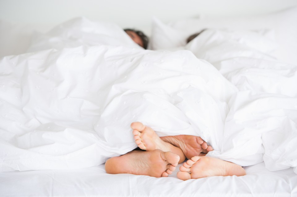 anonymous photo of couple in bed