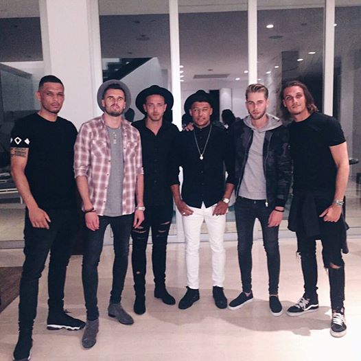  Carl Jenkinson (second from left) and Alex Oxlade-Chamberlain in holiday mode