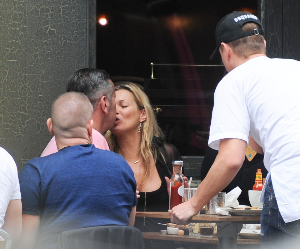  Kate pecks her pal on the lips