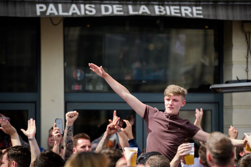  Fan fun ... supporters were singing and dancing side-by-side yesterday