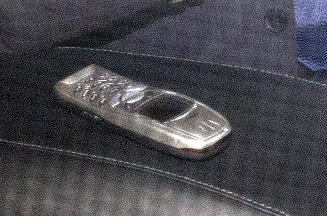  Sir Philip Green leaves his Nokia 6010i mobile phone on the car seat before his appearance in Parliament