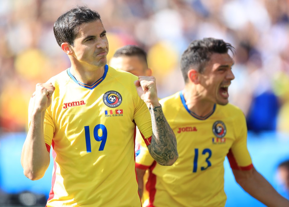  Romania's Bogdan Stancu celebrates scoring his side's first goal