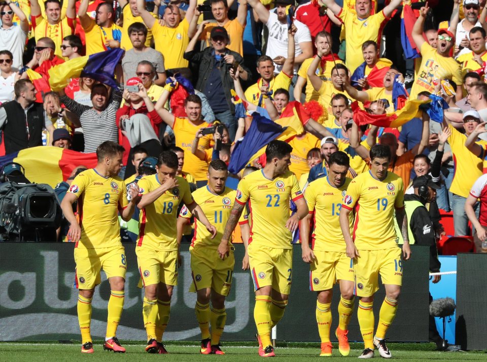  Romania players celebrate after Bogdan Stancu scored against Switzerland