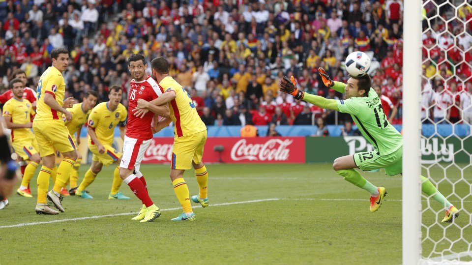  Admir Mehmedi scored Switzerland's first goal past Romania's Ciprian Tatarusanu