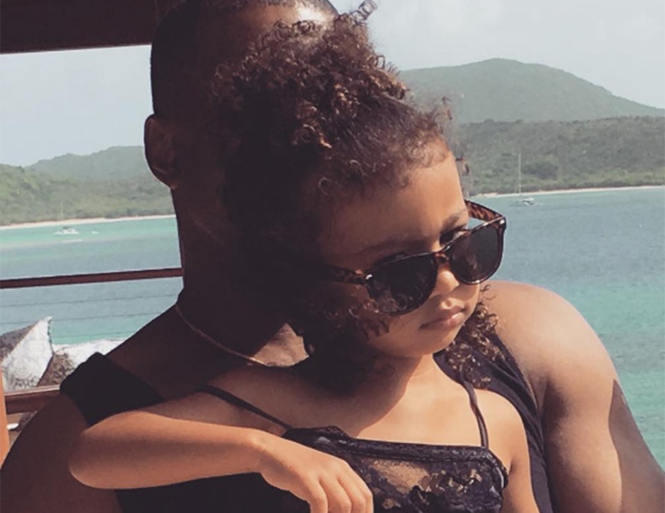  North showed she was Daddy's little girl as she struck on of his famous poses