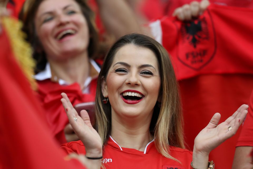  A supporter cheers ahead of kick-off against France