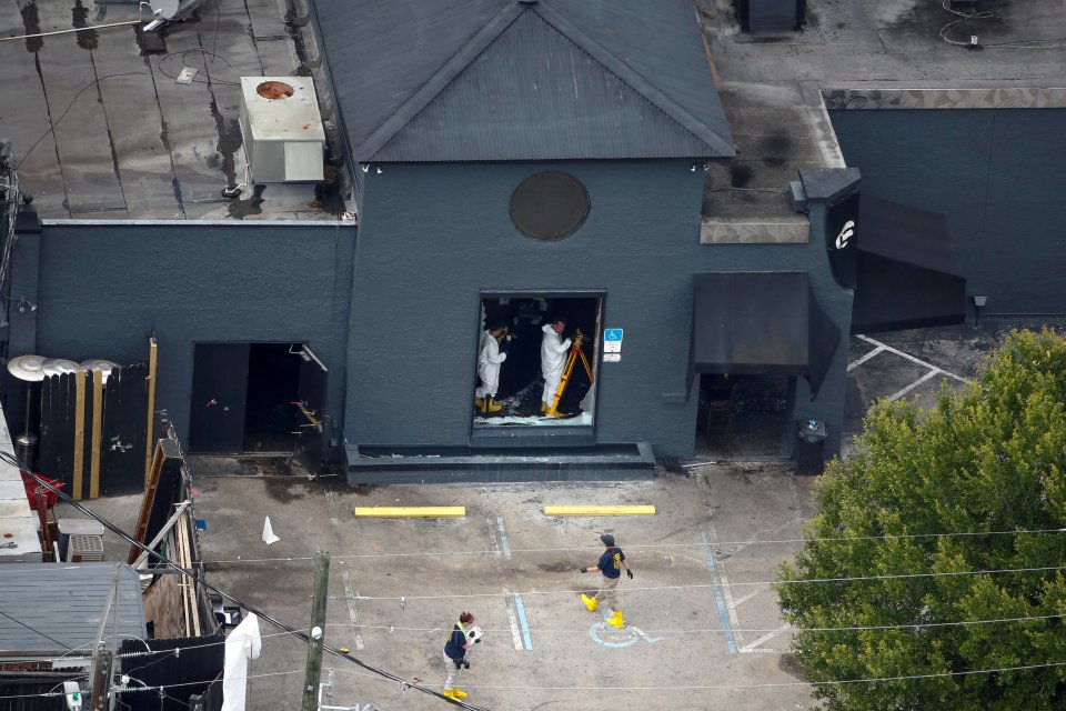 FBI officials collect evidence at Pulse gay night club some days after mass shooting in Orlando