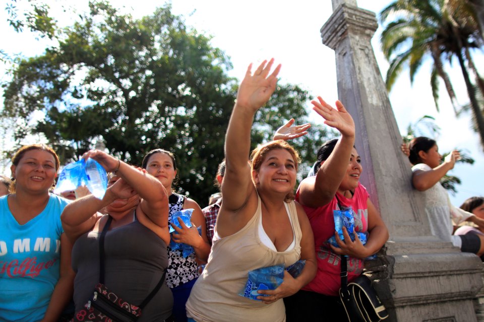  Relatives wave as their family members are moved to more lenient prisons