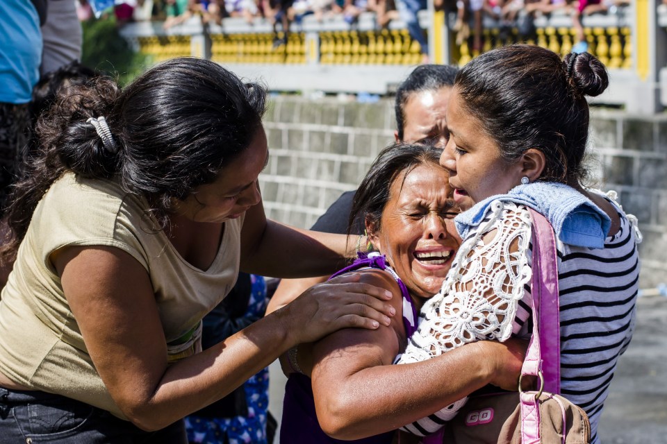  Family members cry as the men are transferred to other prisons