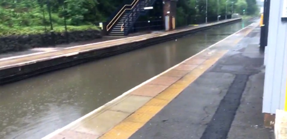  You would be forgiven for thinking this part of Lye station is actually part of the Midlands canal system as the tracks are completely covered