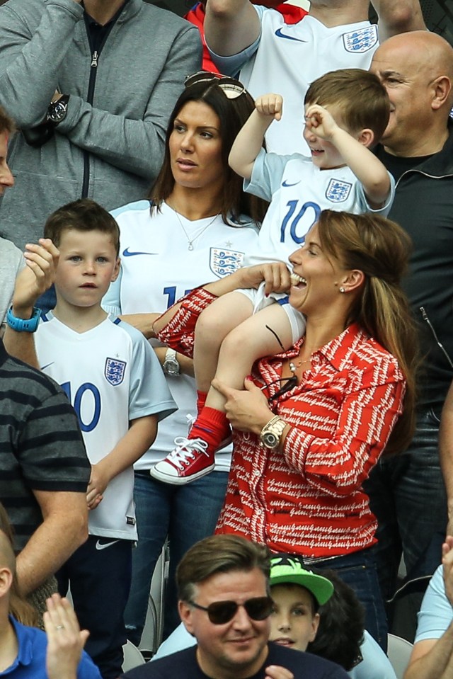  Coleen Rooney and sons Kai and Klay watch Wayne play against Slovakia