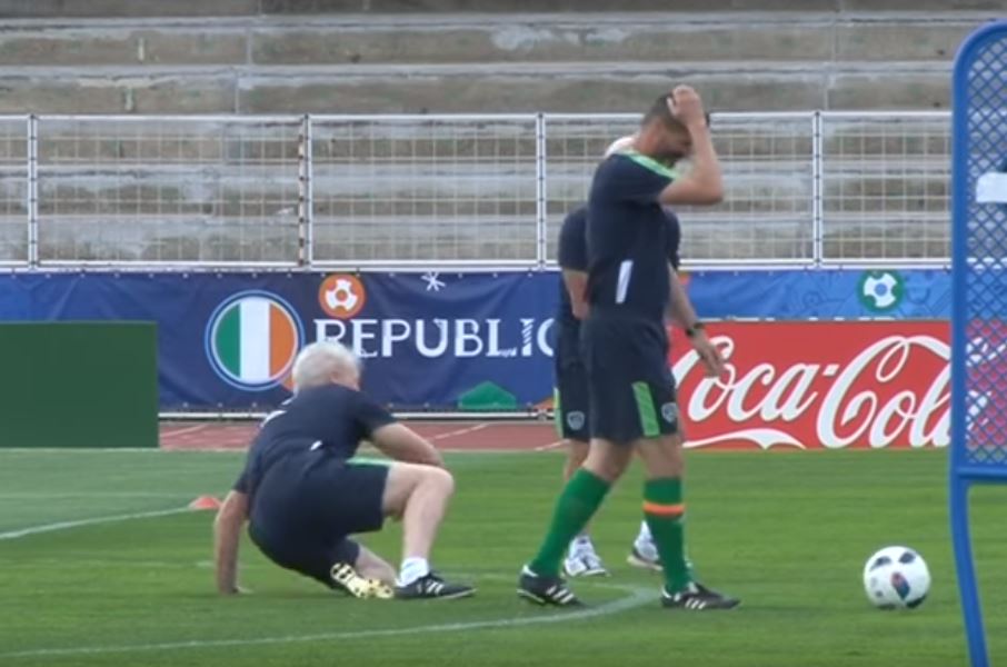  Keane walks away in laughter as Seamus McDonagh tried to climb back to his feet