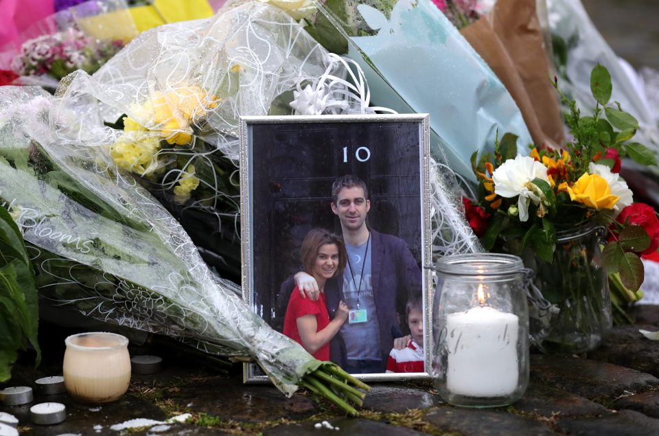  People across the country have left tributes to murdered MP Jo Cox, including this photo of her with her husband Brendan