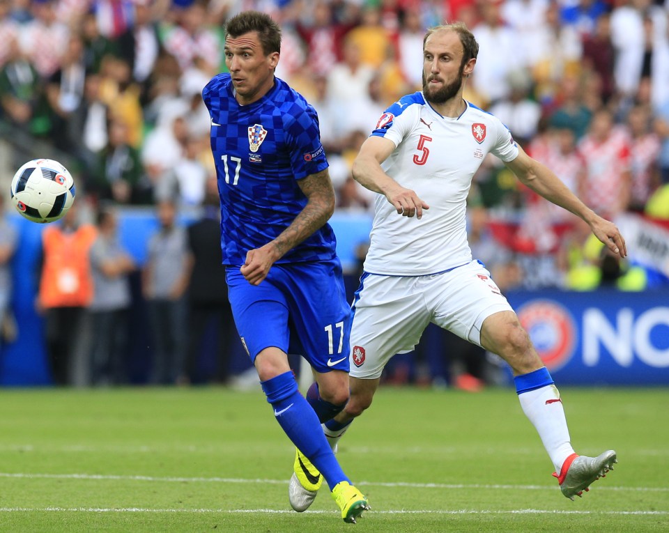  Croatia striker Mario Mandzukic (left) in action against the Czech Republic