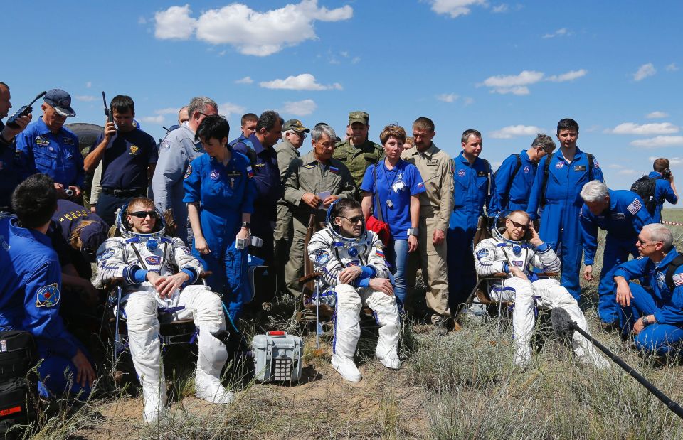 Craving a cold beer and pizza, Tim Peake and crew mates sat in comfy chairs at the landing site