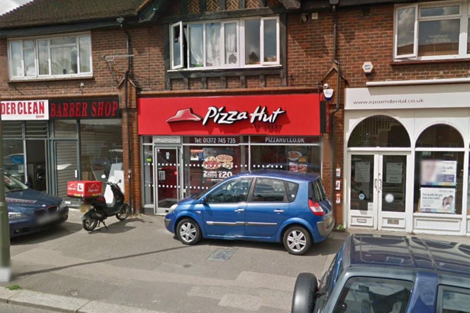  The girl was dragged out of a Pizza Hut in Epsom, Surrey and stabbed and raped